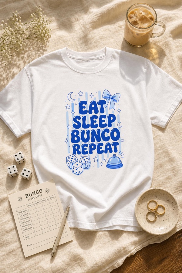 Eat Sleep Bunco Repeat garment dyed tee styled with dice and a score sheet